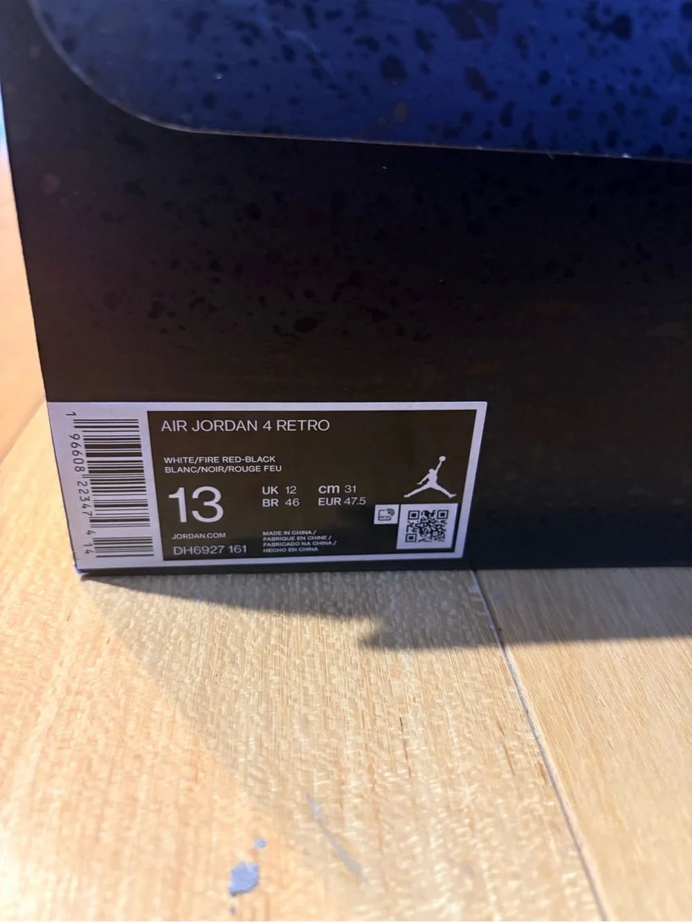 Jordan men’s White/Black/Red Retro Sneaker